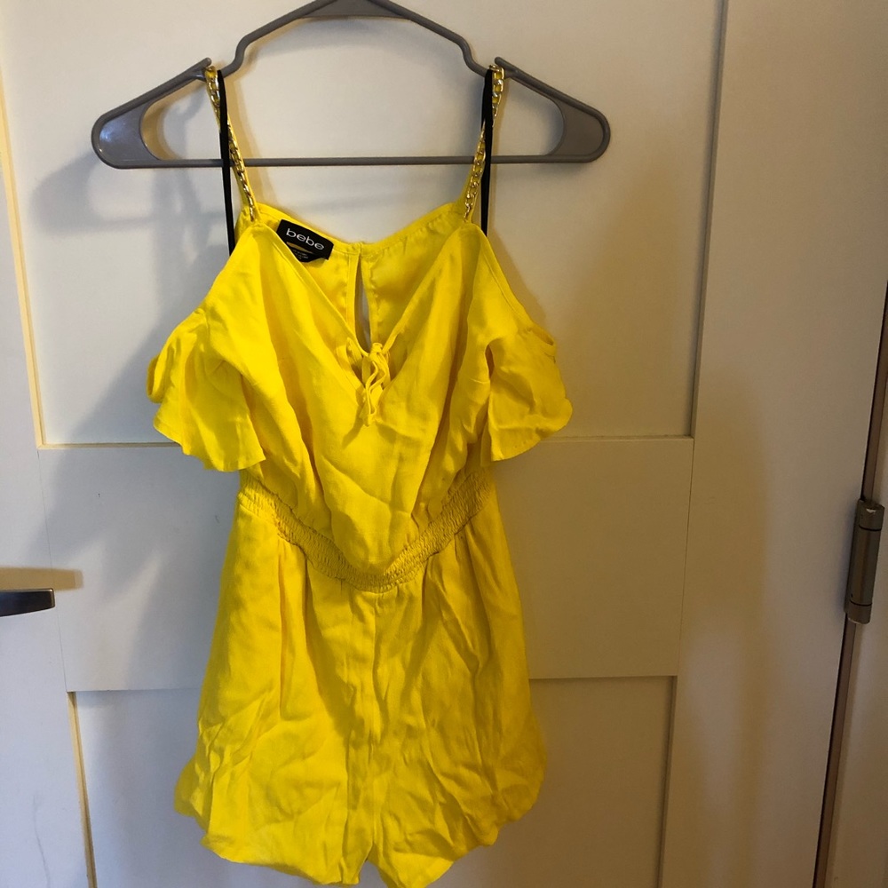 NWTs!!  Women’s Yellow Chain Detail Romper - bebe